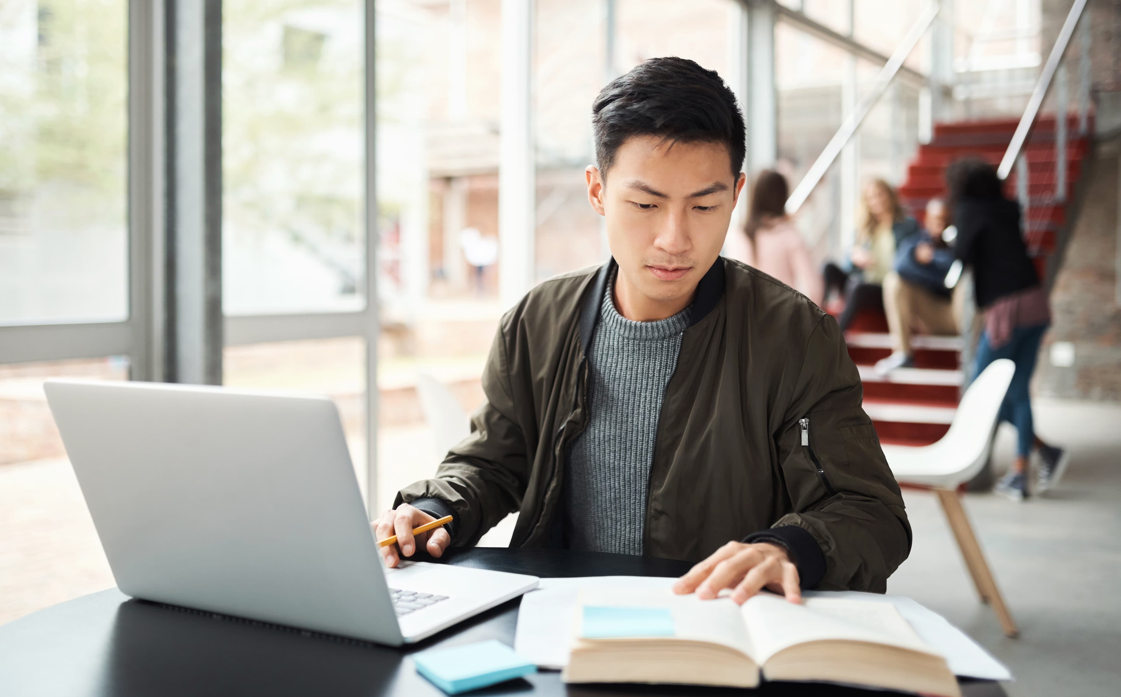 Law student focused on reading course material