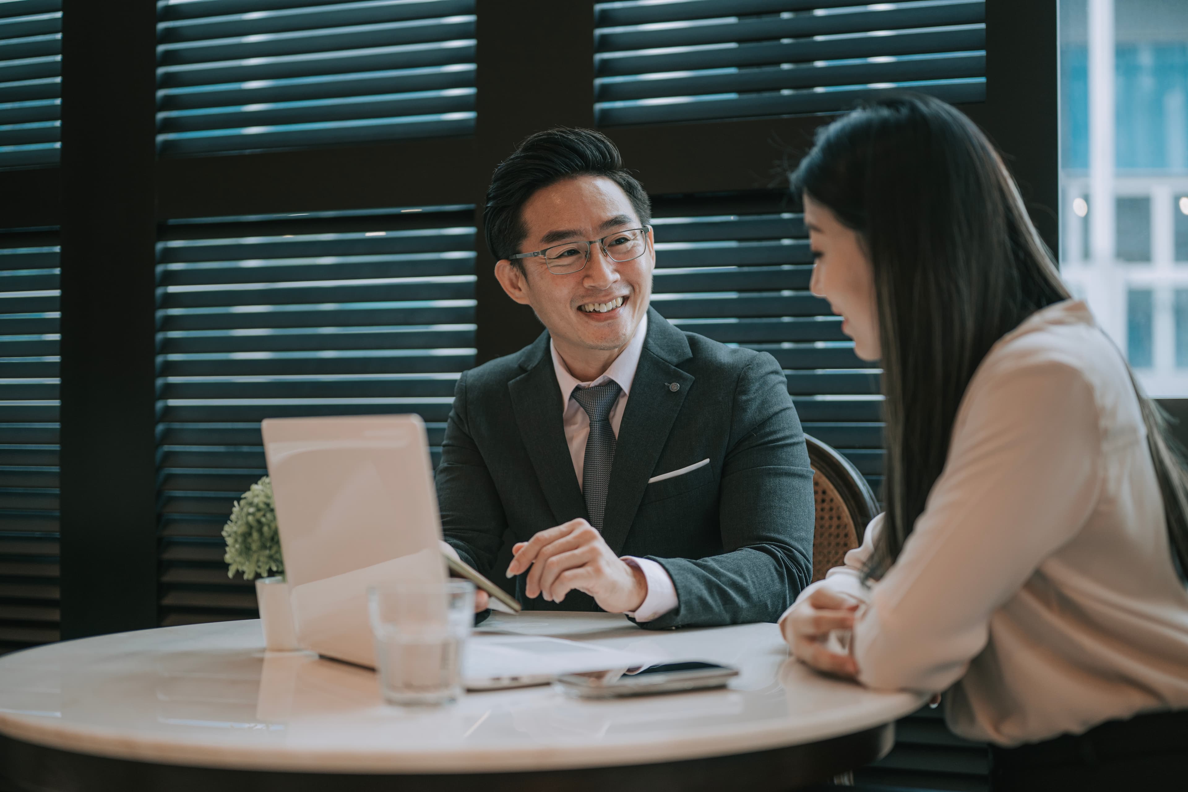 Two law students studying together and talking