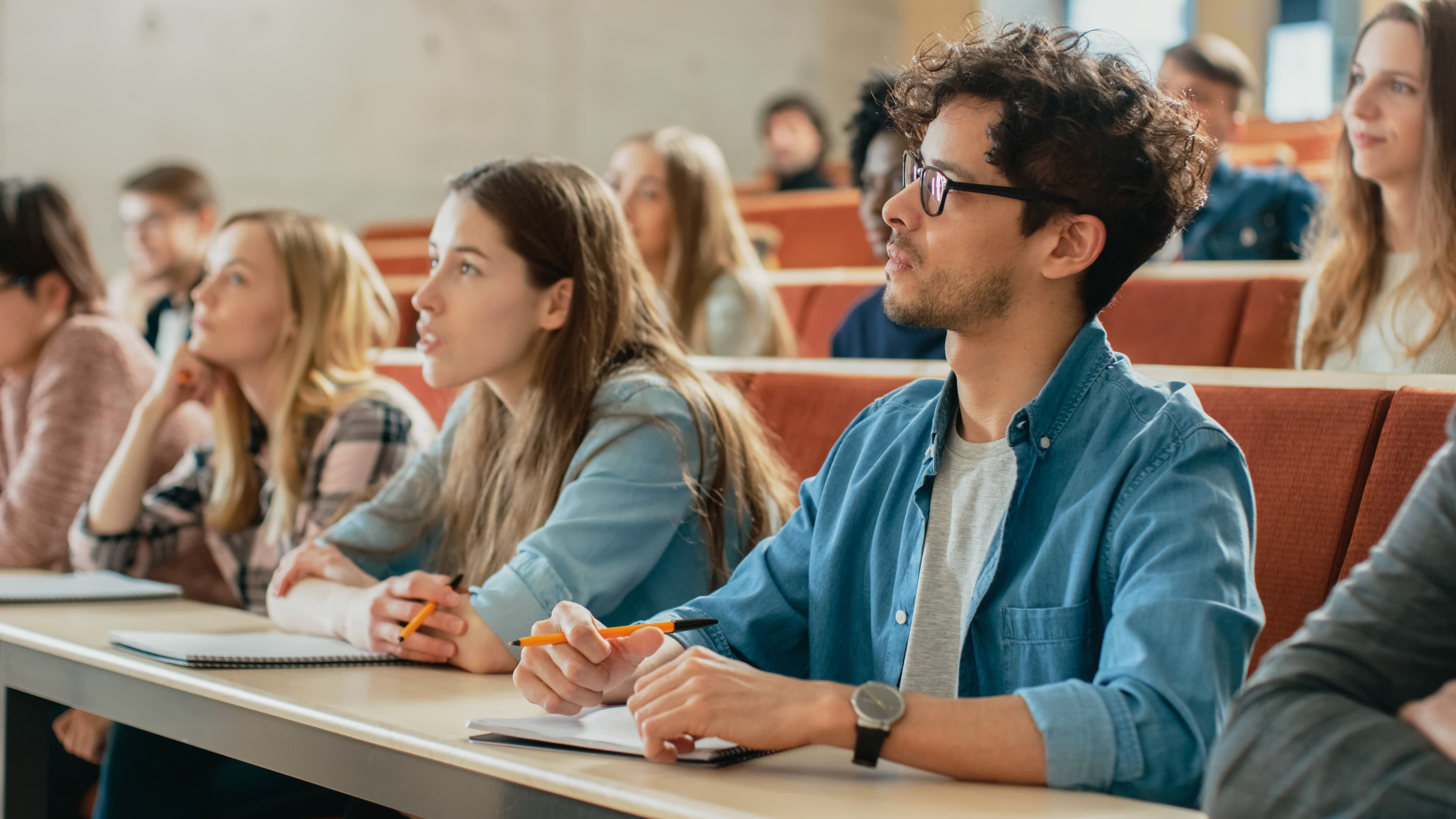 Law students listening in a lecture hall